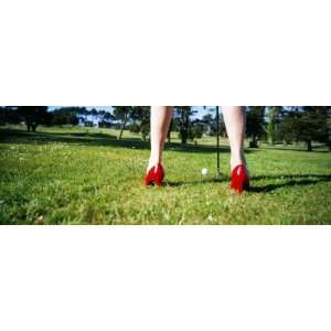 Woman Golfing in High Heels, San Francisco, California, USA Premium 