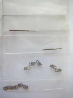 Big lot of Omega clamps, crowns & stems watch parts  