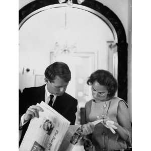  Attorney General Robert Kennedy and Wife Looking at Copy of the New 