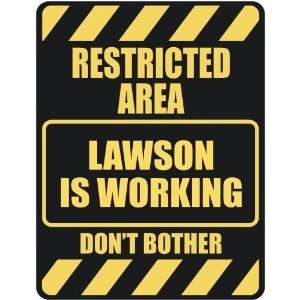   RESTRICTED AREA LAWSON IS WORKING  PARKING SIGN