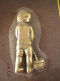 Vintage NEW, Unopened Bathroom Child Brass Wall/Door Decoration.