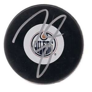 Taylor Hall Autographed Puck