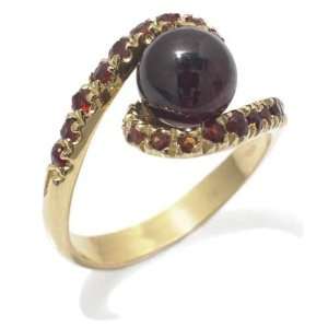   Ring in Yellow 18 karat Gold with Garnet, form Contour, weight 6 grams