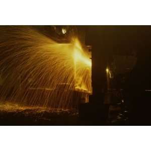  Welders torch has sparks fly on Locomotive factory Floor 