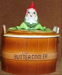   vintage Elf Pixie Gnome sitting on Butter Cooler Keeper Crock  