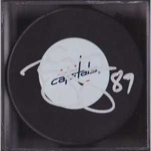 Tyler Sloan Signed Puck   Logo   Autographed NHL Pucks  