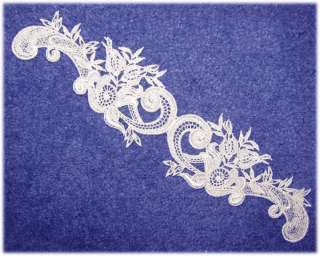 These white appliques are rayon machine embroidered, strong with 