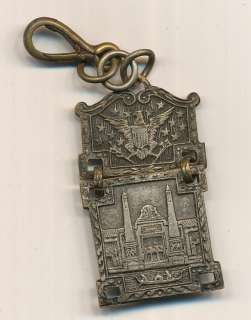 1893 CHICAGO WORLDS FAIR EXPOSITION SOUVENIR WATCH FOB. APROX 2 INCHES 