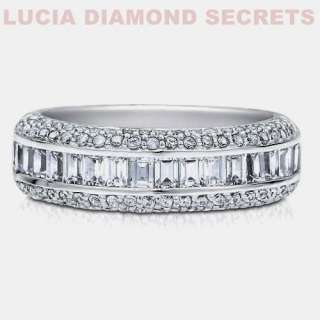 with 16 center emerald cut stones 43 round cut outter band stones 