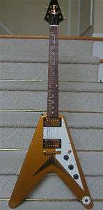 Identified as Gibson Flying V Electric Guitar in category