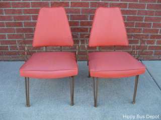   pair of Mid Century Modern Orange Vinyl Douglas Eaton Chairs