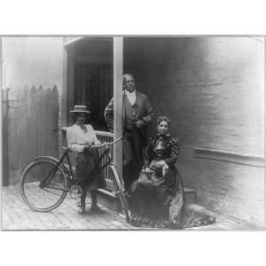  Portrait group man,woman,girl with bicycle,c1900s 